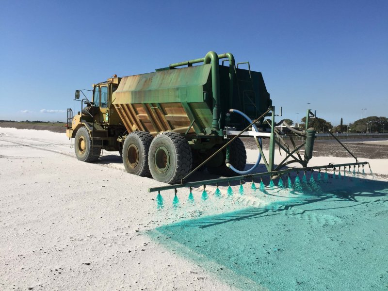 Chemicals being applied out of a truck