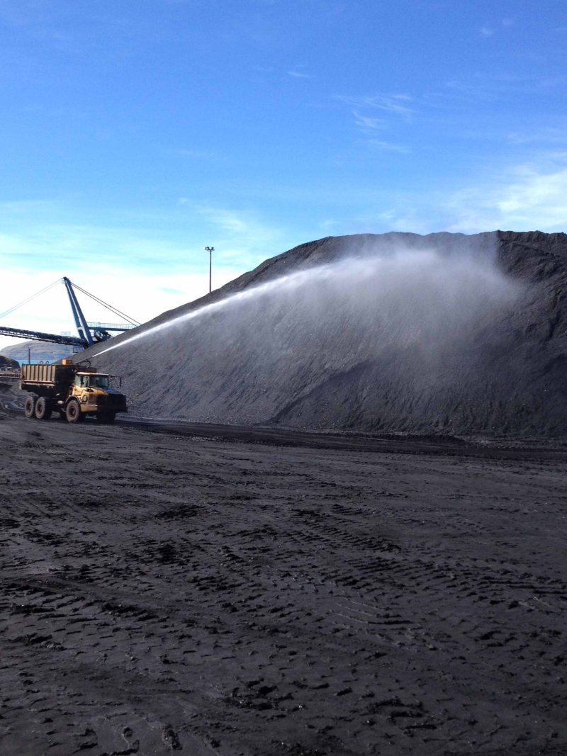 A Vital Chemical truck spraying Bon-Matt CS 300 onto a mine site