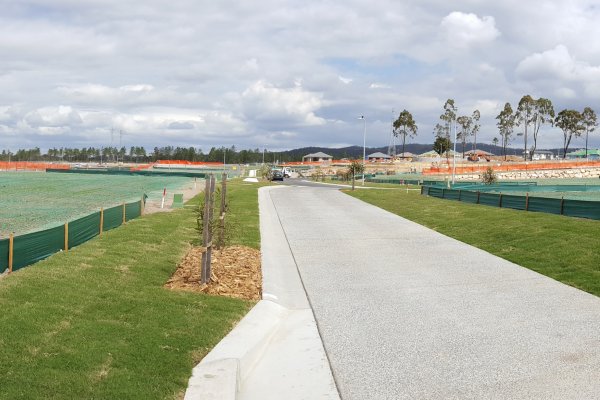 A pathway beside grass