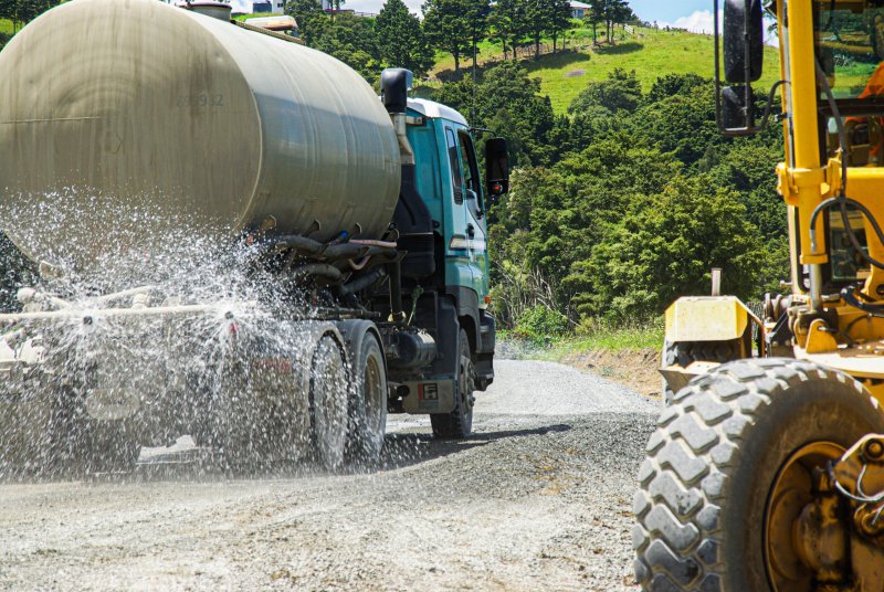 A Vital Chemical truck applying Bon-Matt HR onto a road.