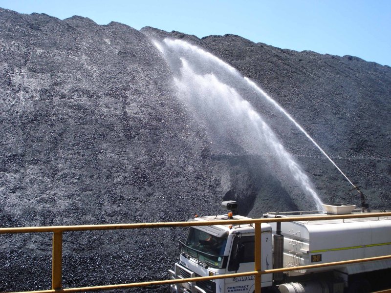 A Vital Chemical truck spraying Bon-Matt CS 300 onto a mine site